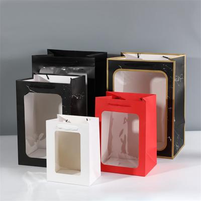 Kreative Marmorpapier- und Kraftpapier-Geschenksäcke mit klarem Fenster